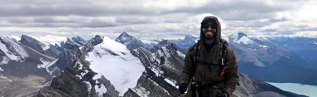 Therapist-Psychologist-Robert-Valela-Mountain Therapist Registered Provisional Psychologist Robert Valela Standing on a Mountain.