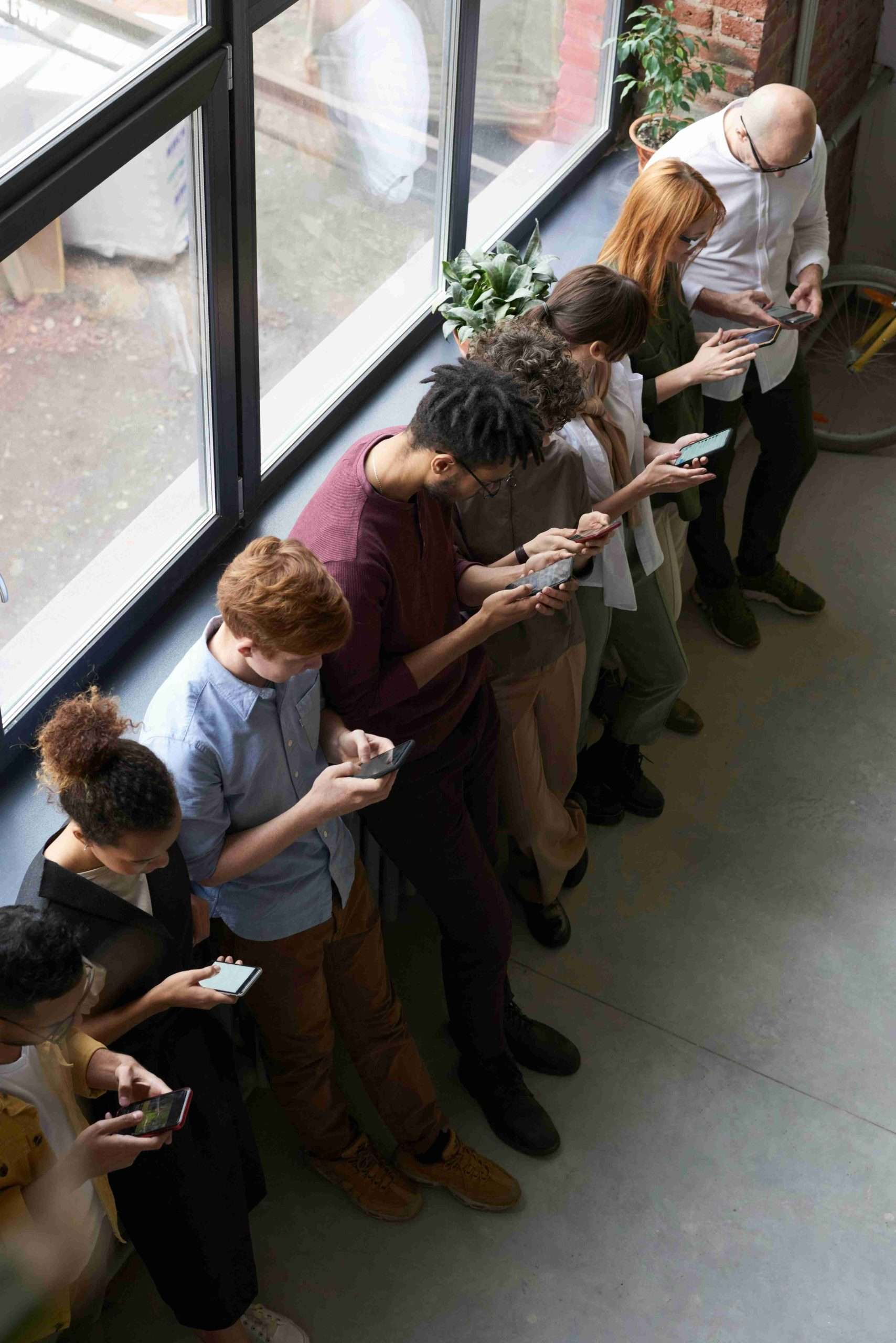 People on phone app standing in a line using GROUND program by Robert Valela Psychologist Therapist People on phone app standing in a line using GROUND program by Robert Valela Psychologist Therapist
